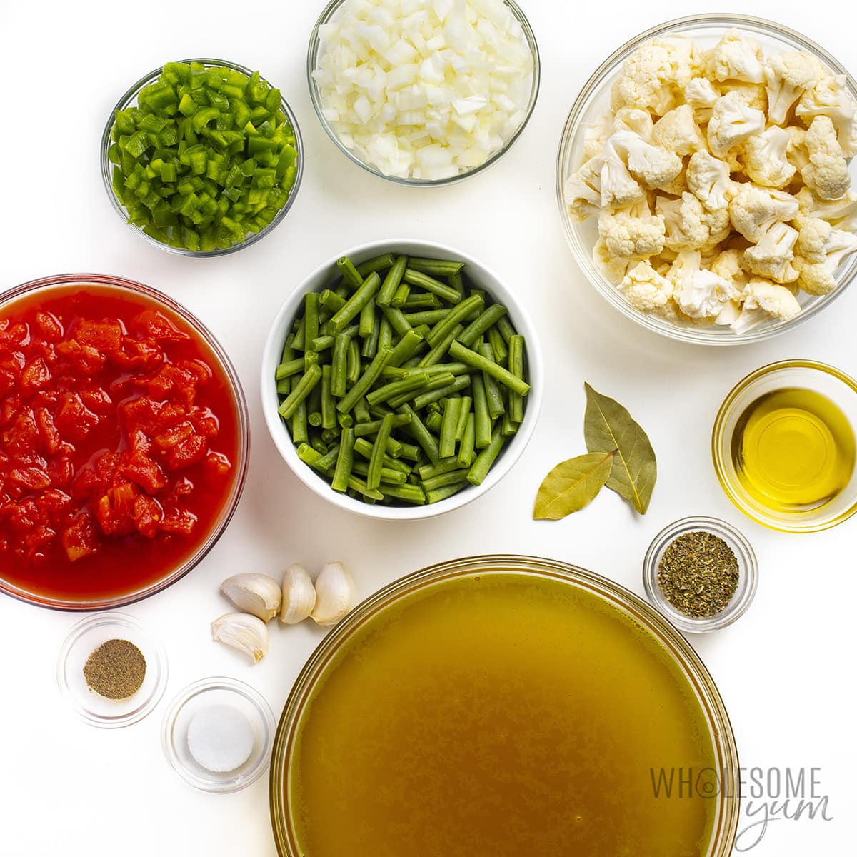 Best vegetable soup recipe ingredients in bowls.