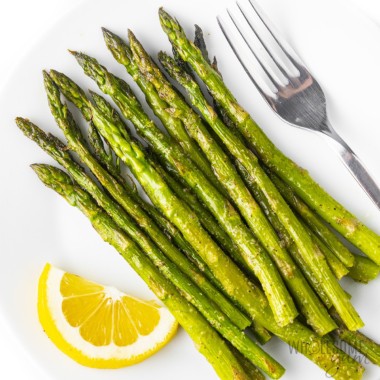 Oven roasted asparagus recipe on a plate.