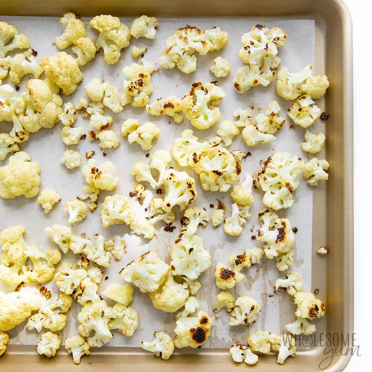 Roasted cauliflower for soup on a sheet pan.