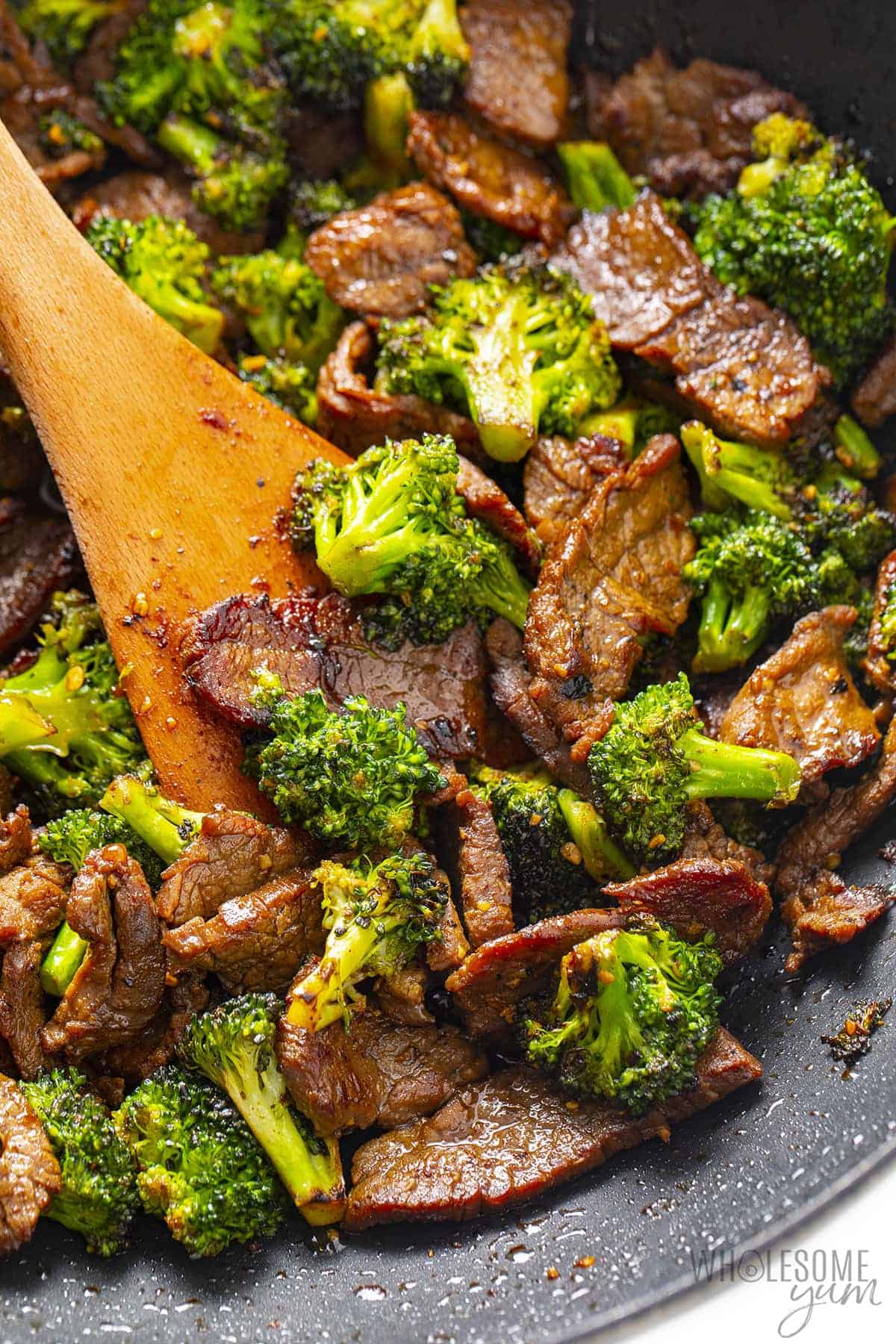 Skillet with beef and broccoli.