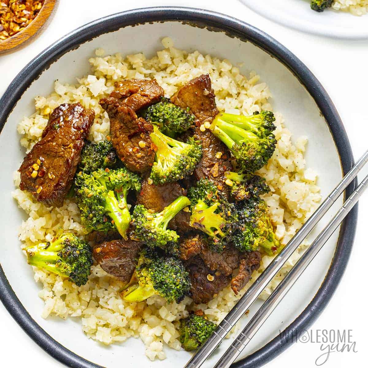 Keto beef and broccoli recipe over cauliflower rice.