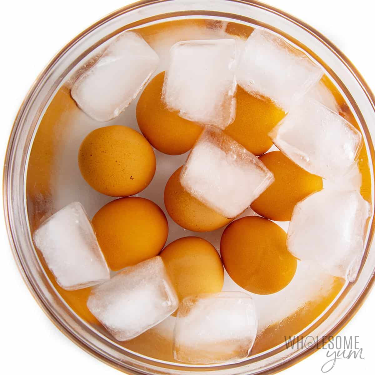 Boiled eggs plunged in ice water.
