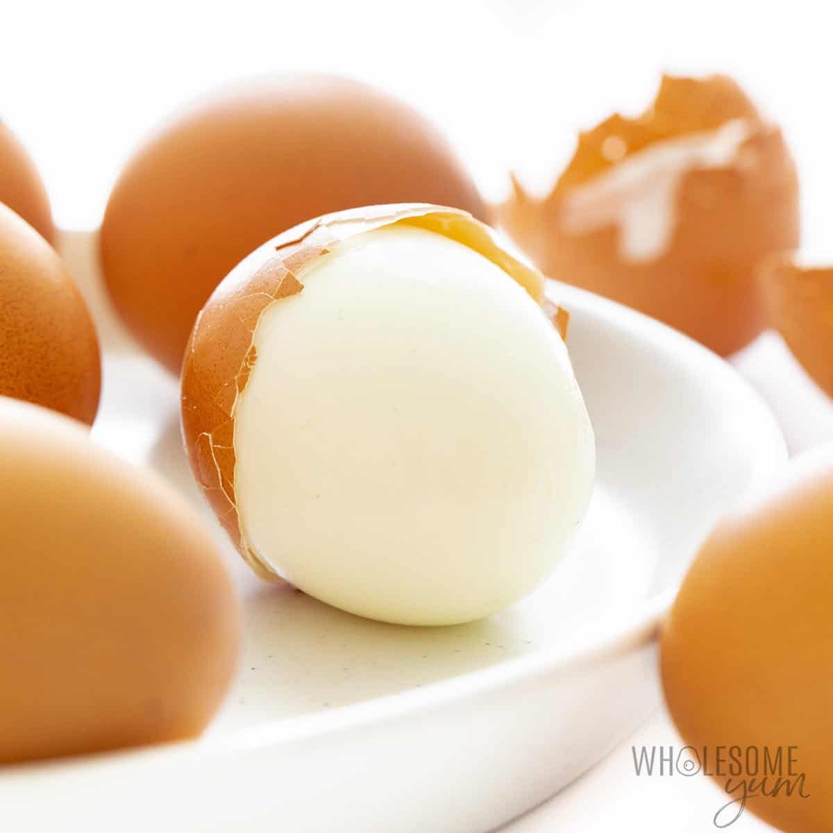 Easy peel hard boiled eggs with shell partially removed.