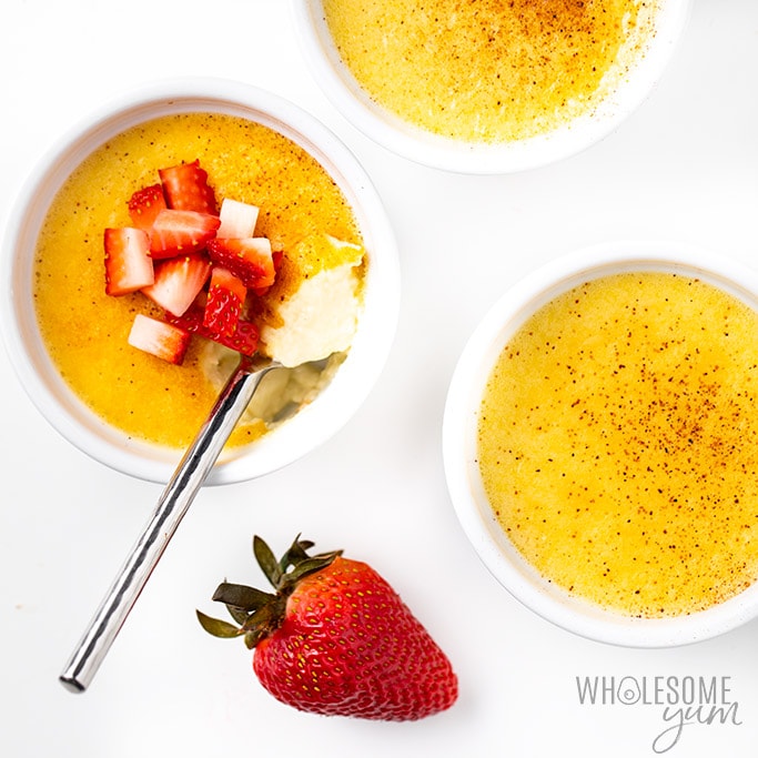Low carb custard with spoon and strawberries
