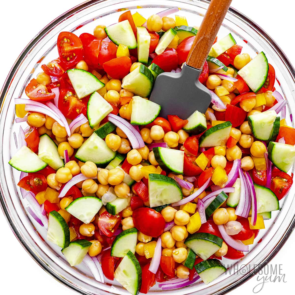 Fresh vegetables tossed in a bowl.