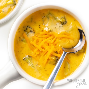Easy broccoli cheese soup recipe with cheddar on top.