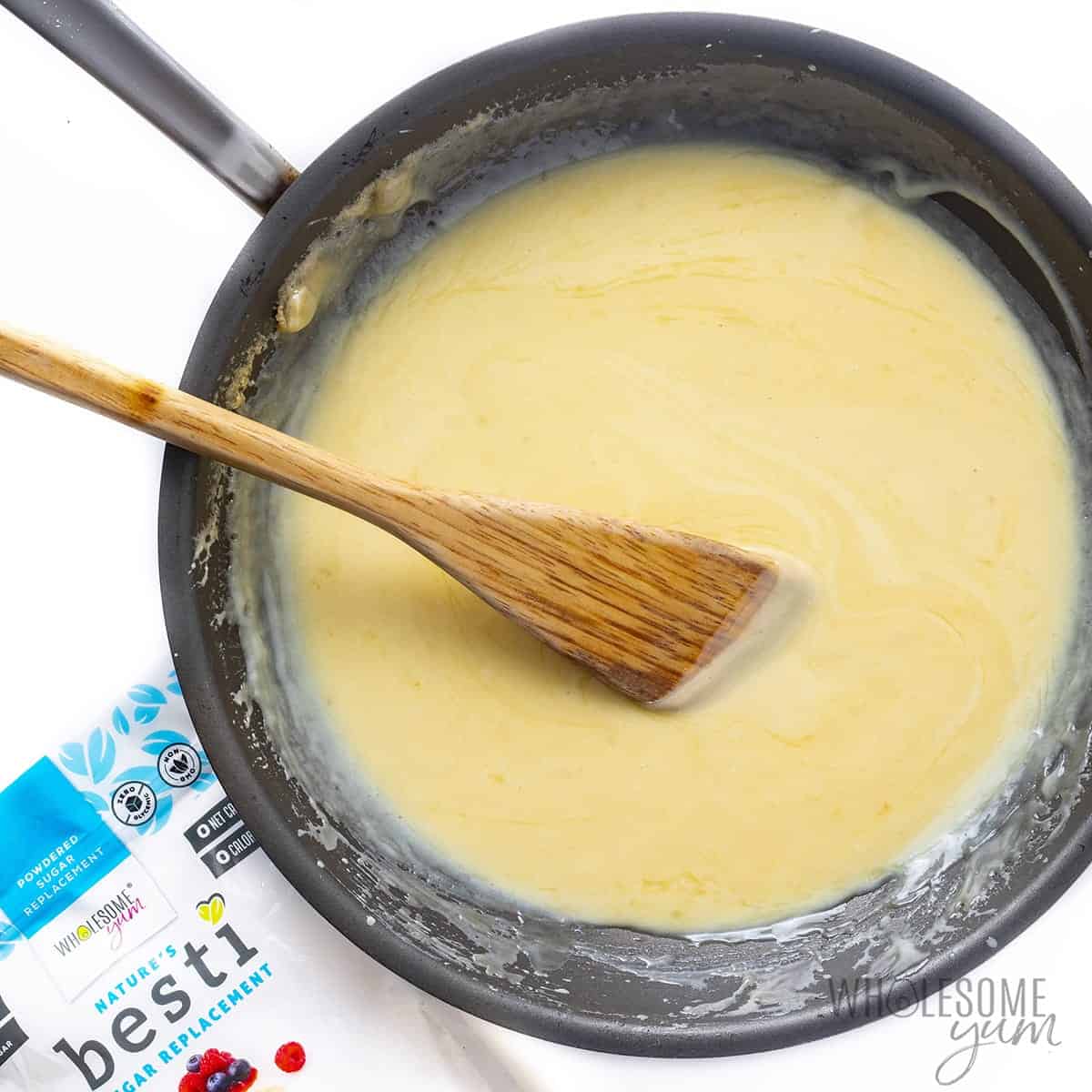 Unsweetened sweetened condensed milk in a pan.