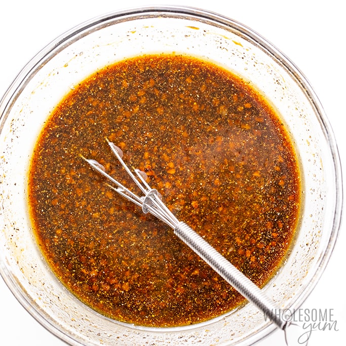 sauce for healthy Mongolian beef in bowl with whisk