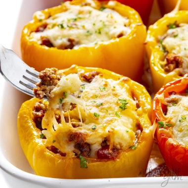 Keto stuffed peppers with fork.