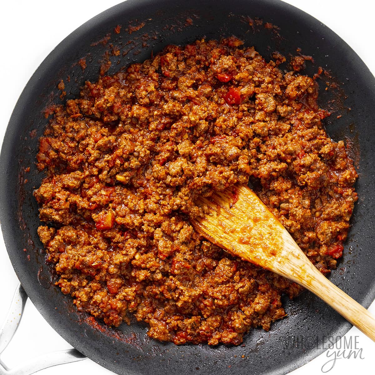 Meat sauce mixture simmering in a pan.