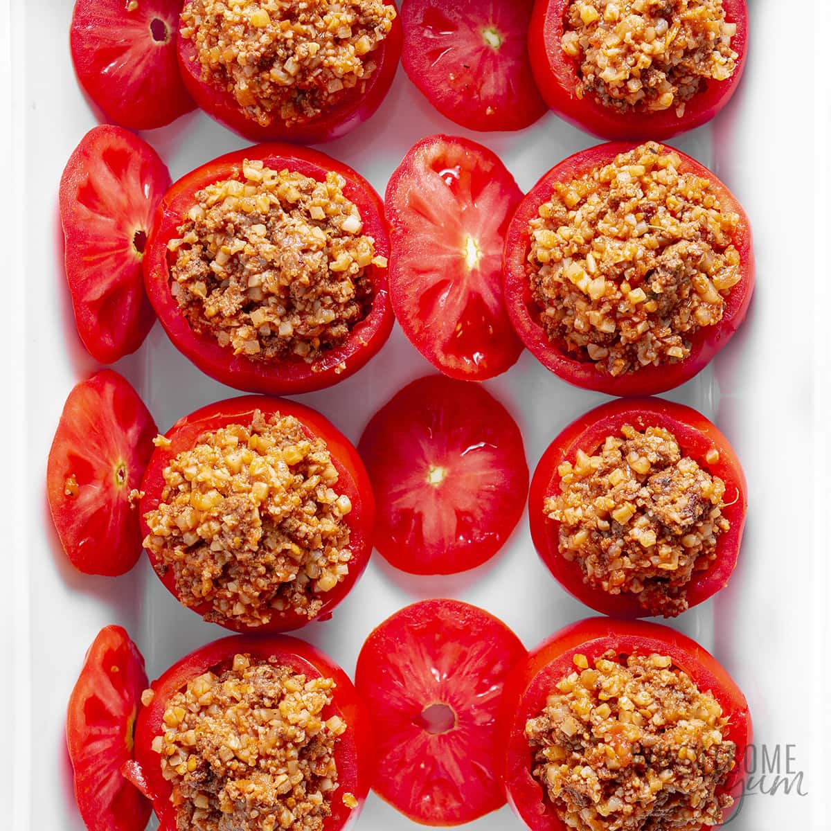 Tomatoes stuffed with ground beef mixture.