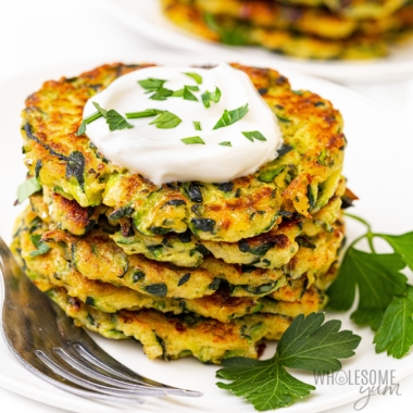 Zucchini fritters in a stack.