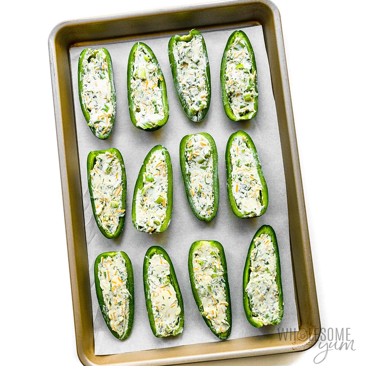 Jalapeno halves filled with cheese mixture.