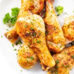 plate of oven baked chicken legs Detail: easy-crispy-baked-chicken-legs-drumsticks-recipe-8