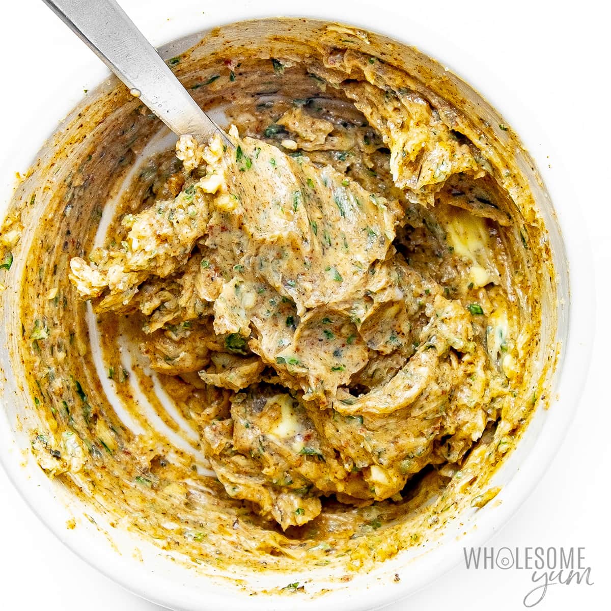 Herb butter mixture in a bowl.