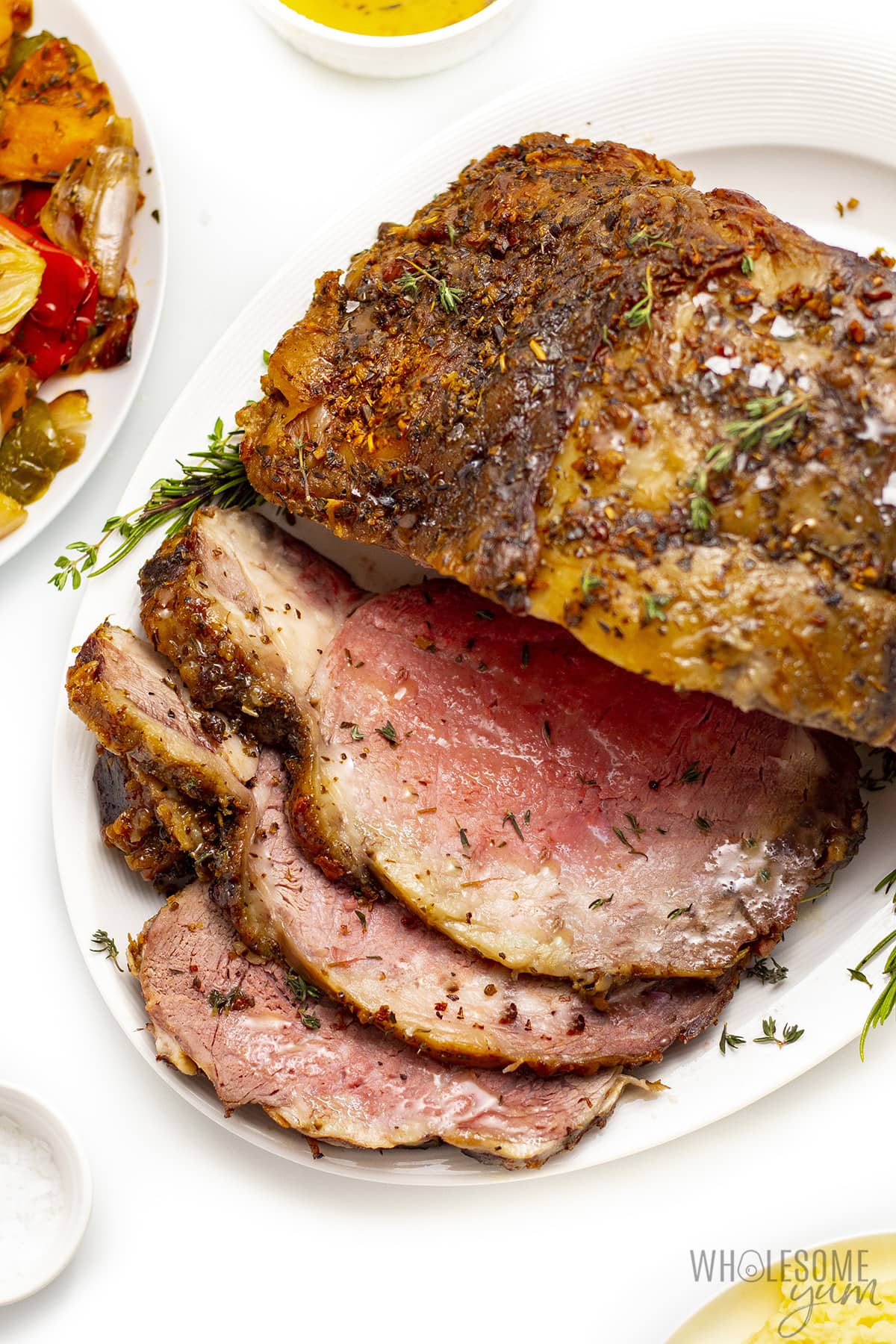 Prime rib roast on a platter.