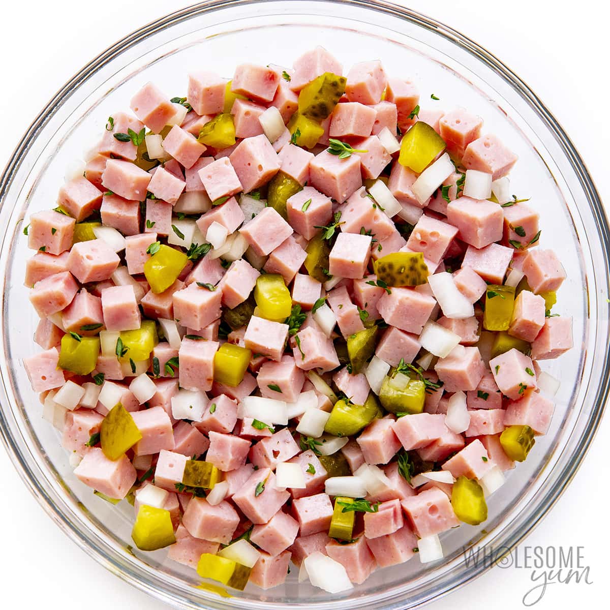 Ham and other ingredients in a bowl.