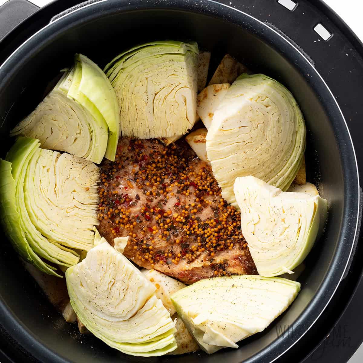 Vegetables added to the Instant Pot with the corned beef.