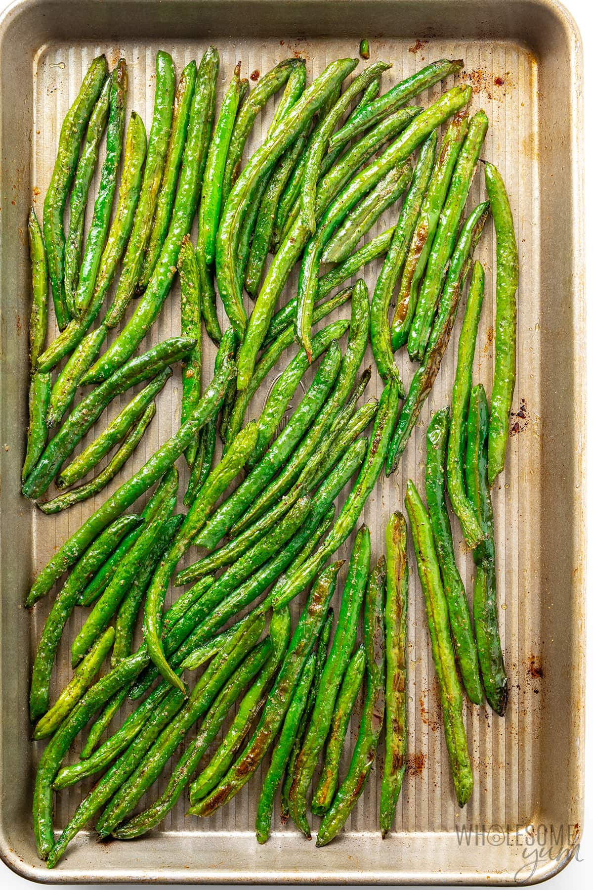 Simple roasted green beans on a sheet pan.