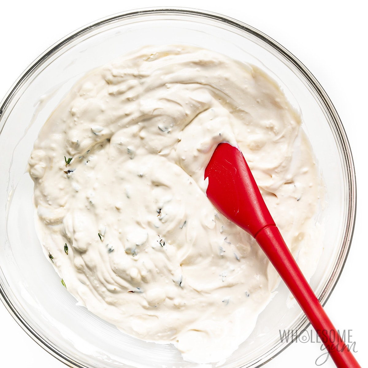 Cream cheese, sour cream, molasses, thyme, and salt mixed together in a bowl.