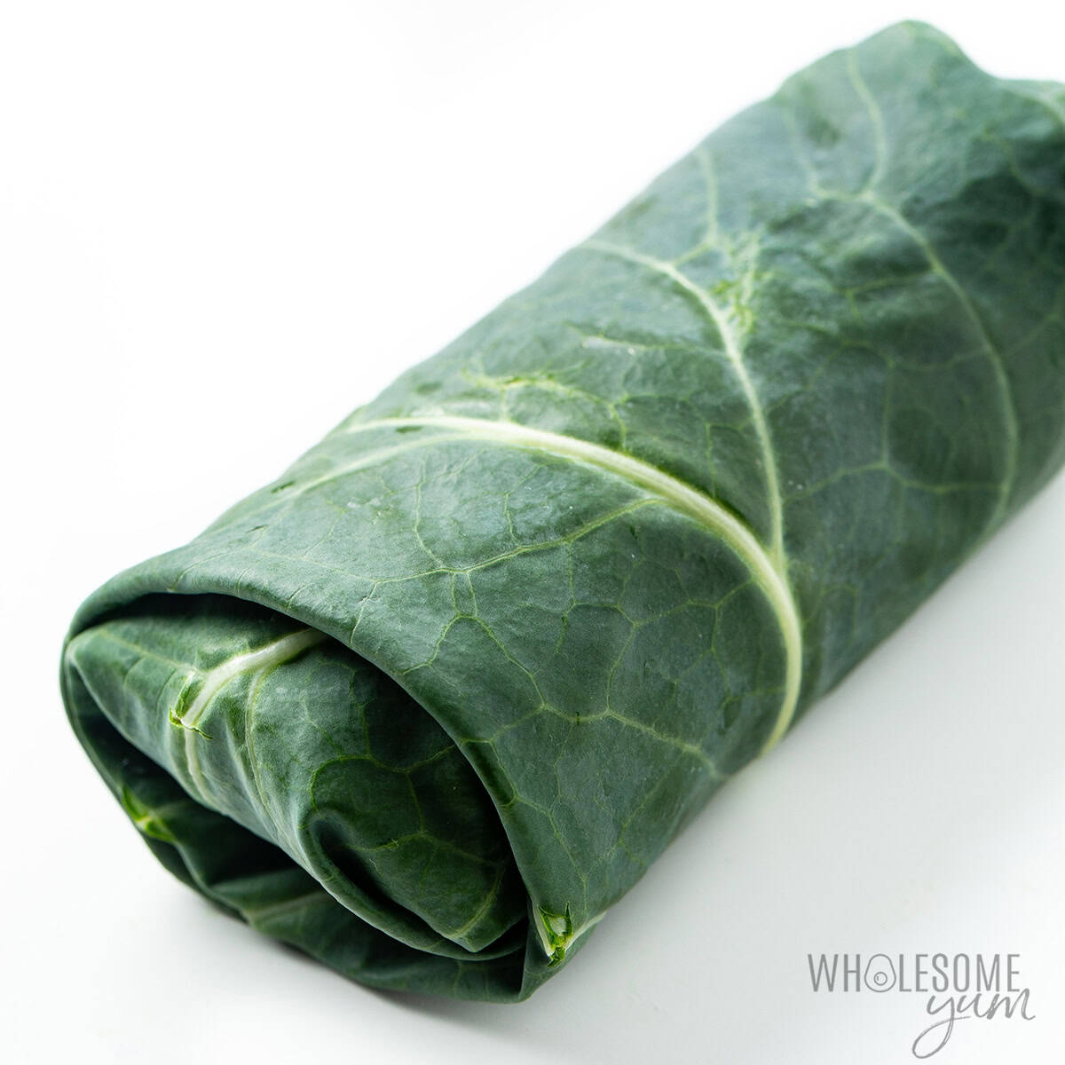 Collard green wrap rolled up tightly.