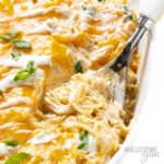 Spaghetti Squash Casserole on a plate with a spoon inserted.