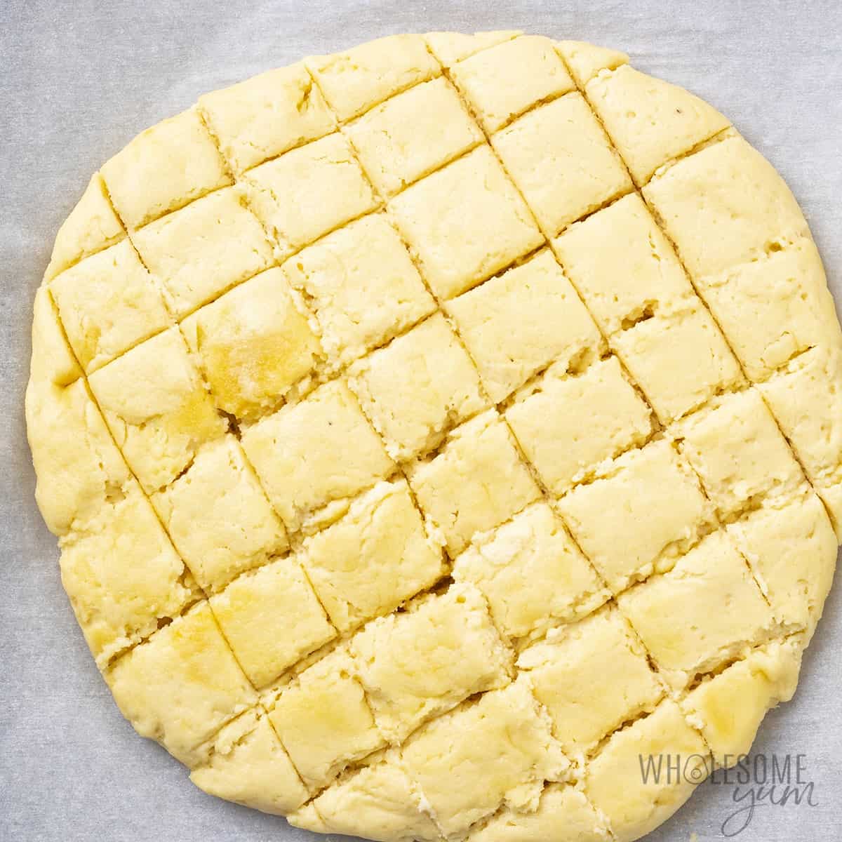 Keto cheesy bread with cut grids.