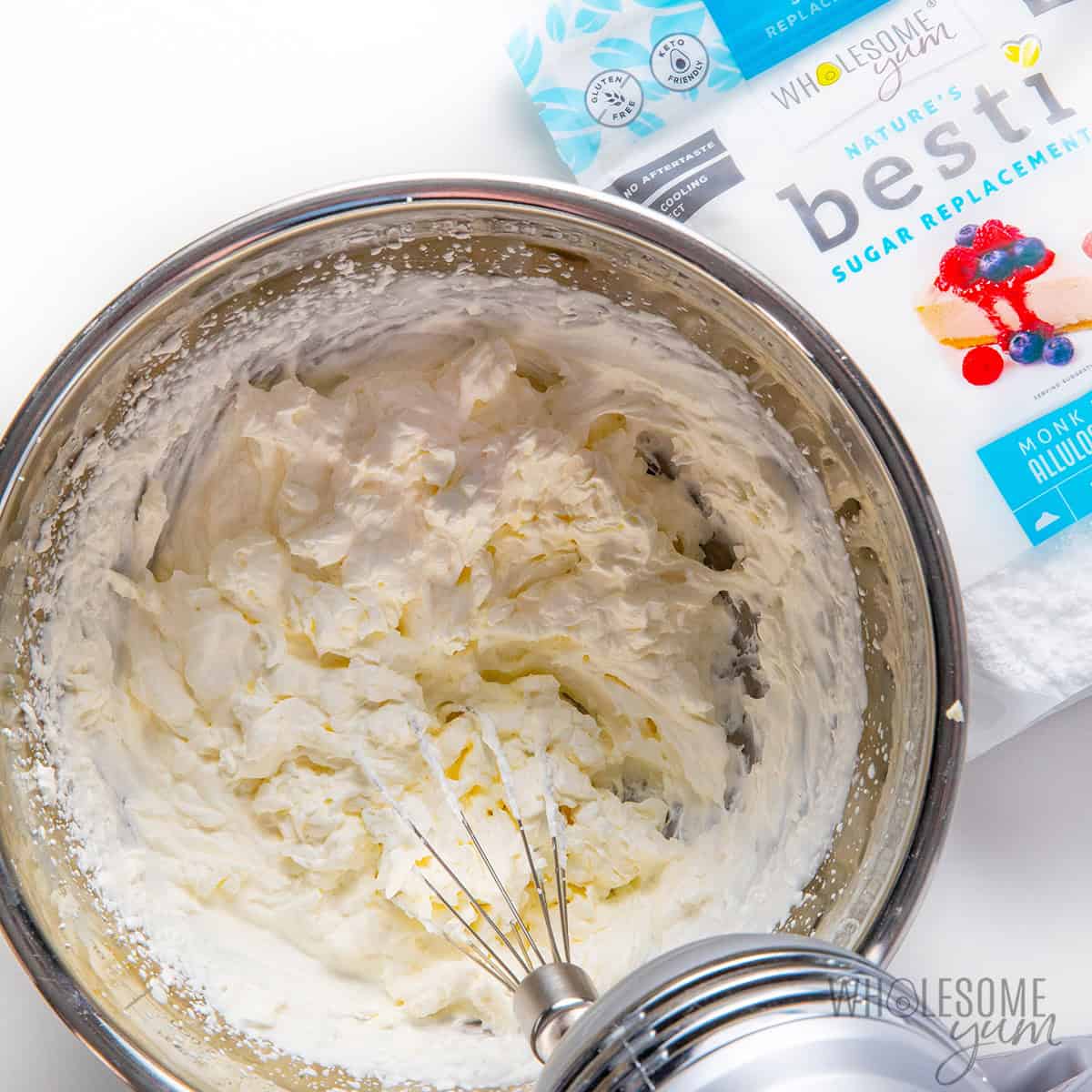 Whipping whipped cream in a bowl.