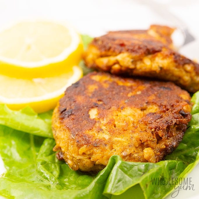 keto salmon patties on a bed of lettuce