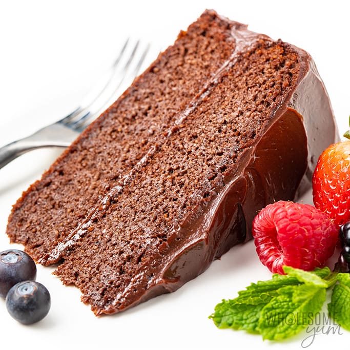 slice of chocolate keto cake with berries