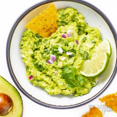 Guacamole recipe in a bowl with a chip.