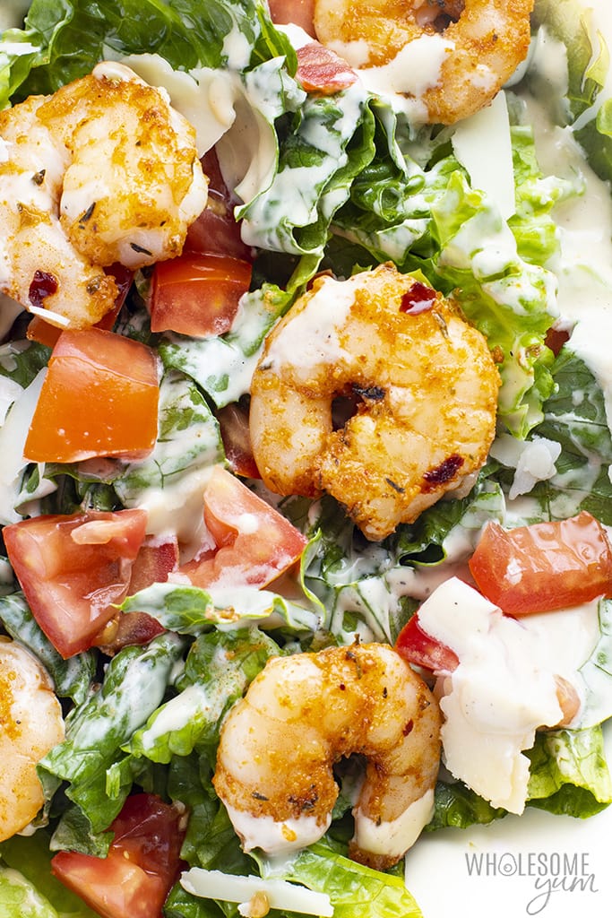 Close-up shot of homemade Caesar salad with shrimp