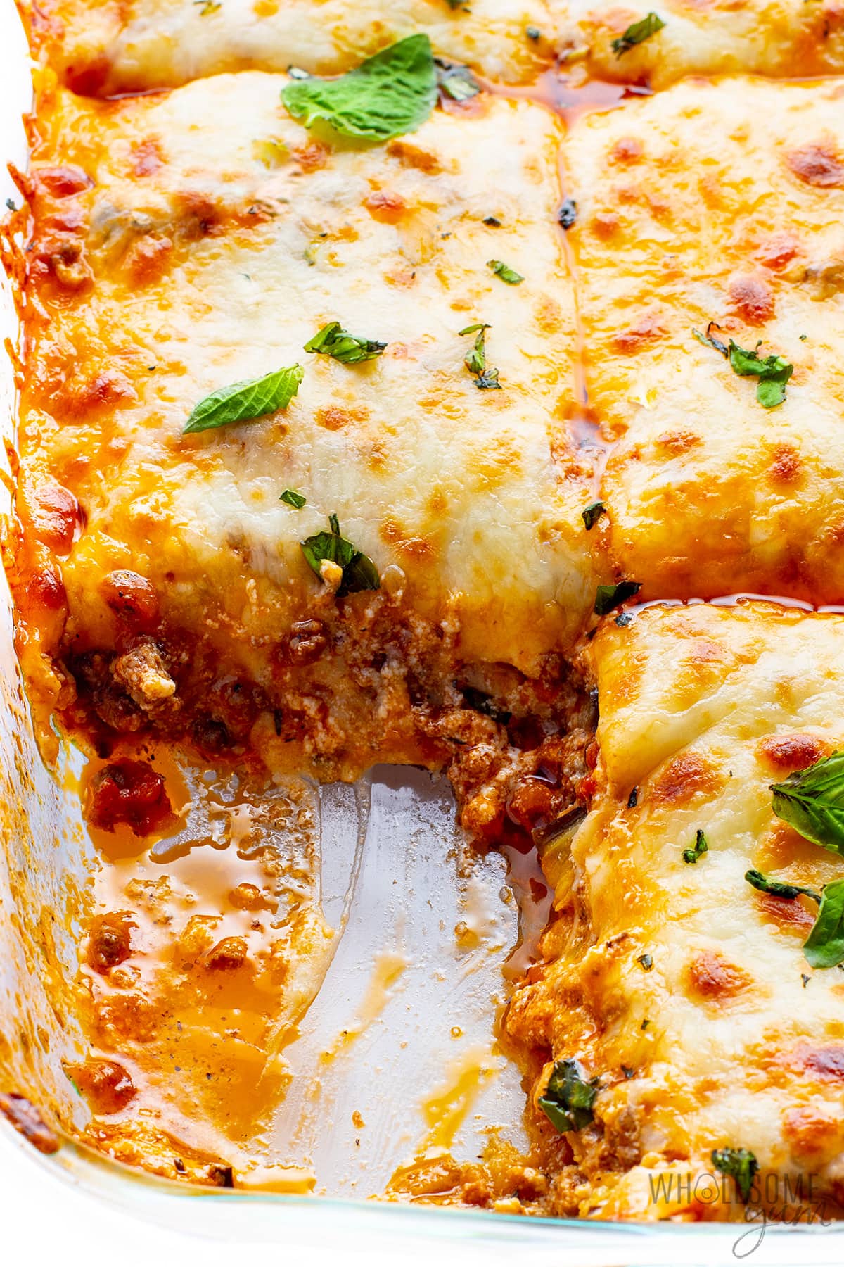 Showing the inside of lasagna with eggplant in a baking dish.