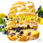 Keto Blueberry Zucchini Bread Recipe, sliced, blueberries and lemon wedges