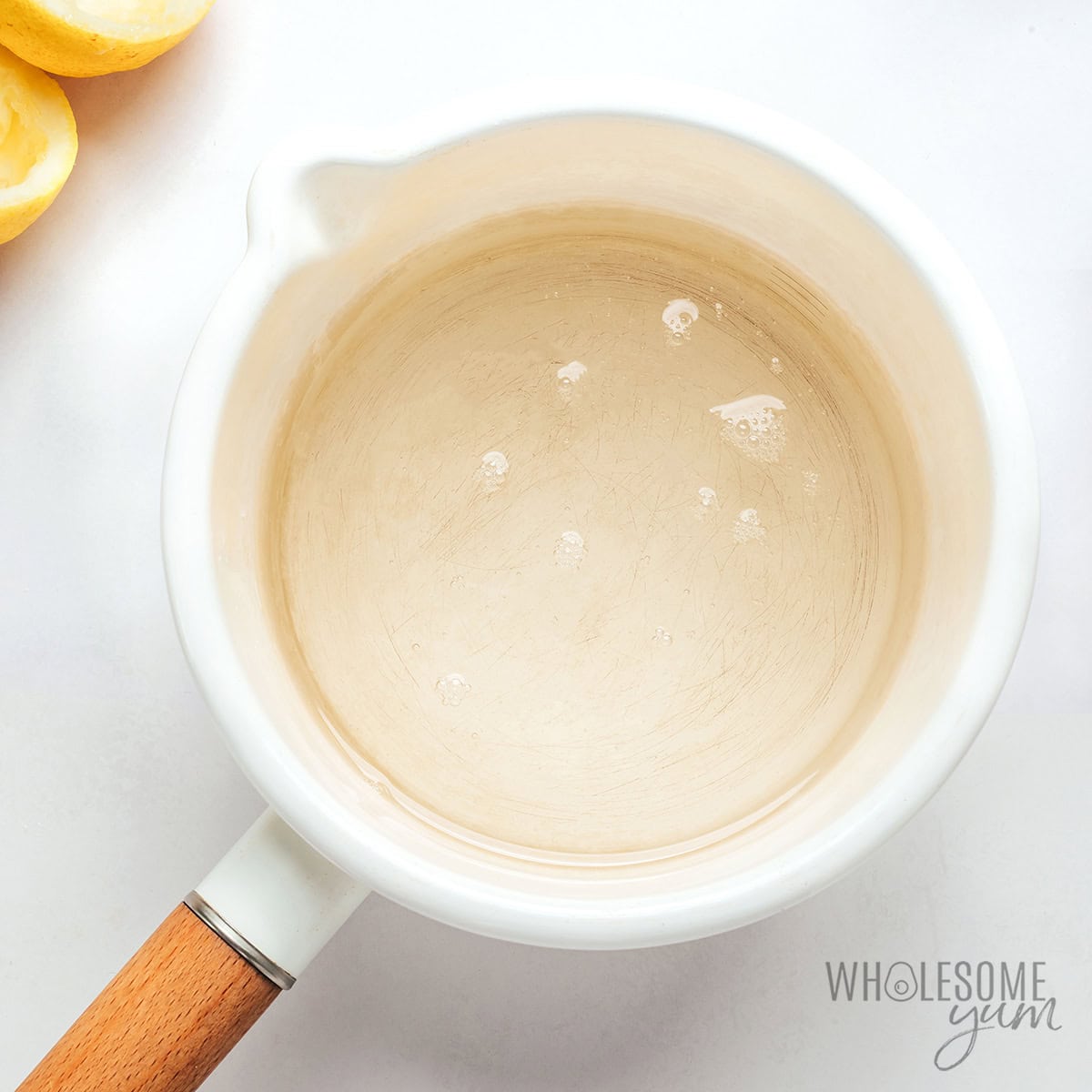 Simple syrup in a saucepan.