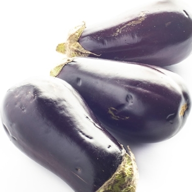 Three eggplants on white background.