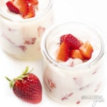 Keto cheesecake fluff with strawberries in jars