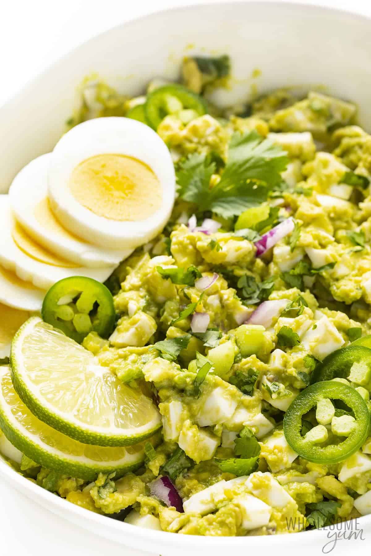 No mayo egg salad with avocado in a bowl.
