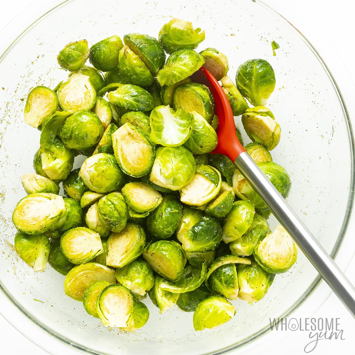 Toss the Brussels sprouts with salt, pepper, and garlic powder in the oil.