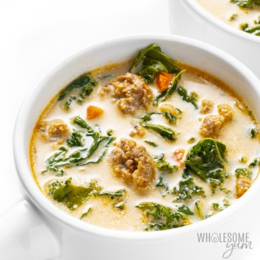 Sausage and kale soup in a bowl.