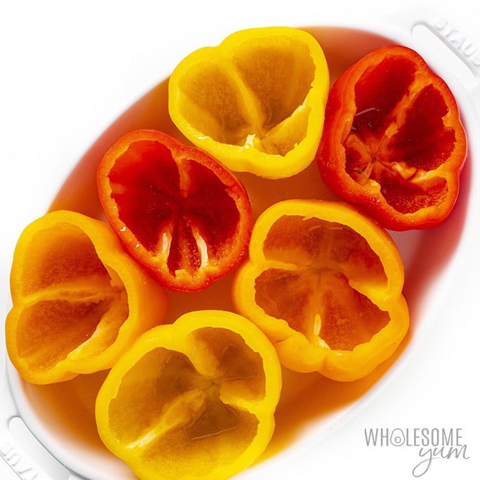 Overhead view of empty bell peppers in a casserole dish