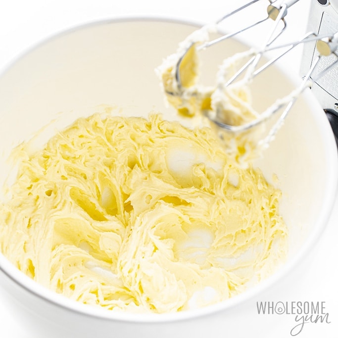 Side view of whipped butter with a hand mixer