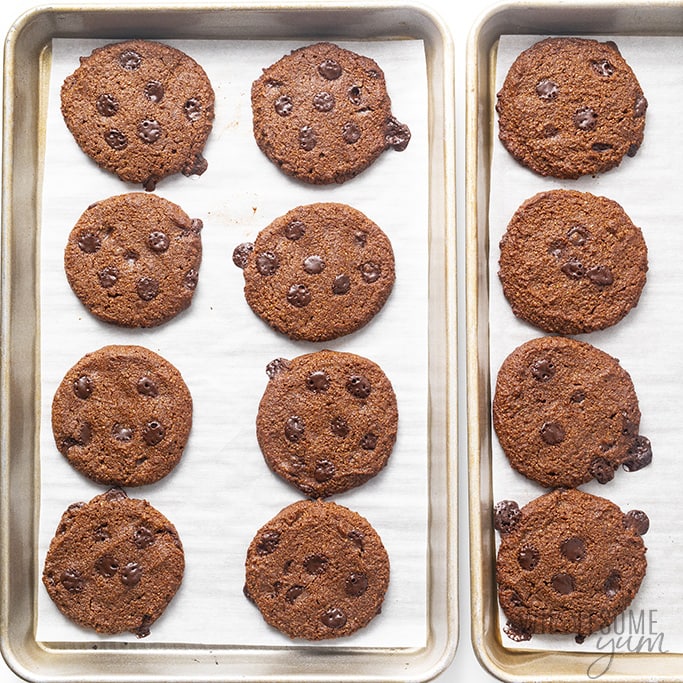 Overhead view of baked cookies on sheet pans