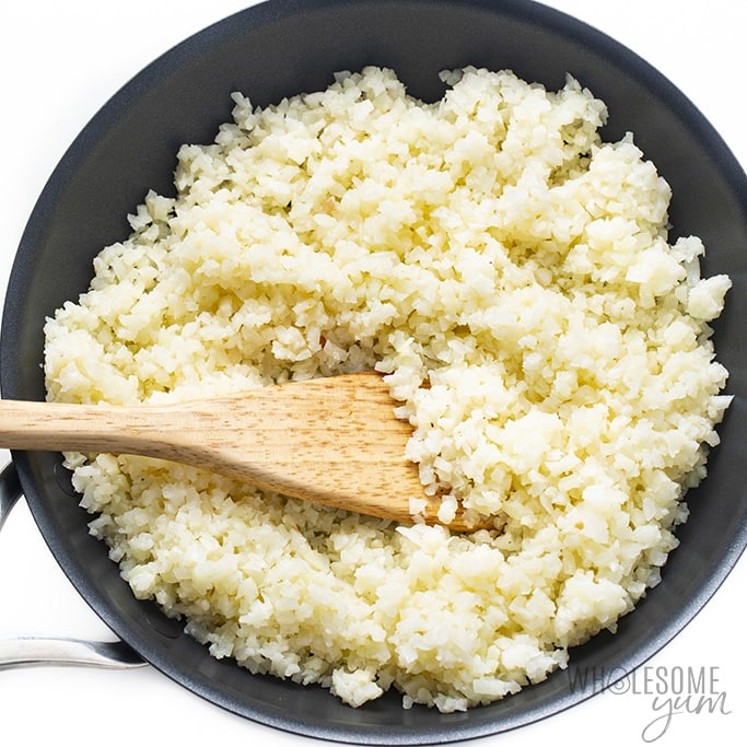 Overhead view of cauliflower rice in a pan