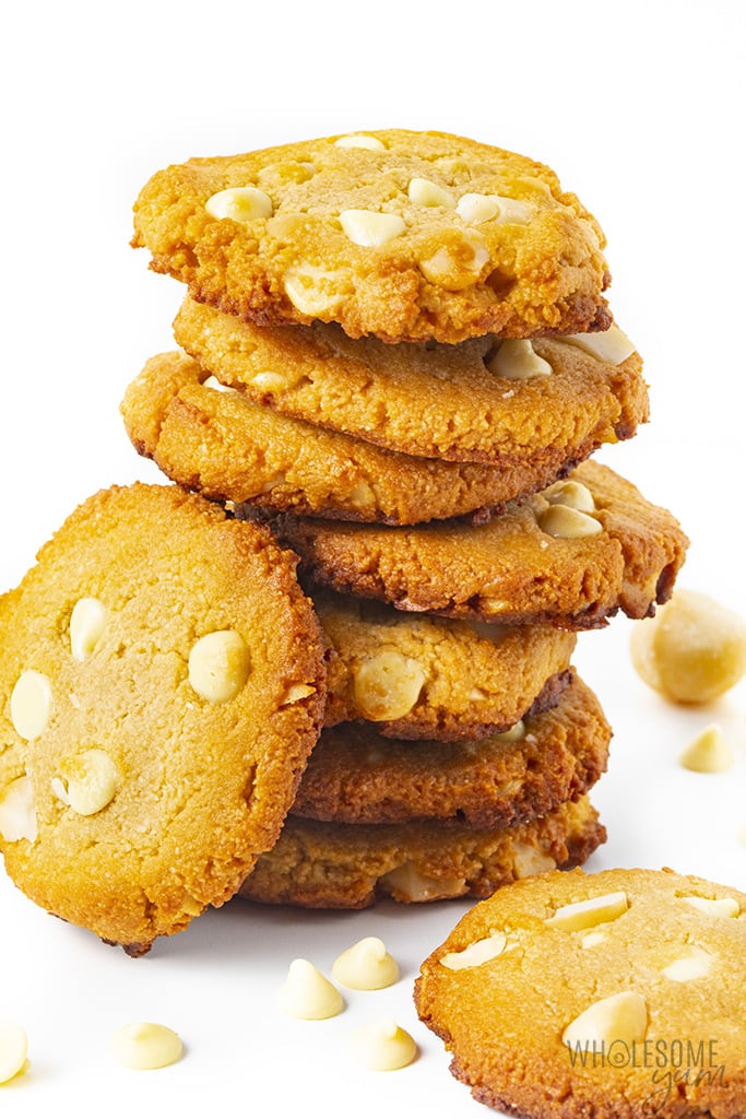 Side view of a stack of keto white chocolate macadamia nut cookies 