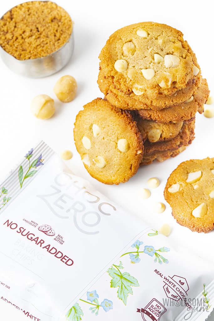 Low carb white chocolate macadamia nut cookies in a stack with ChocZero white chocolate chips