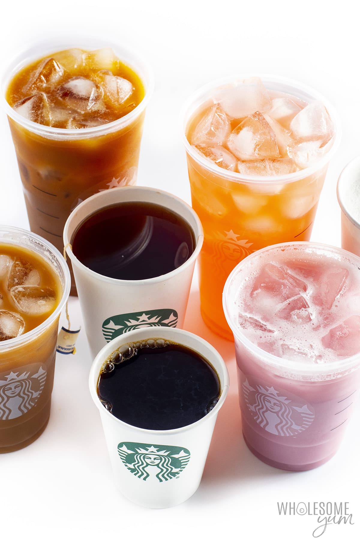 Several different keto Starbucks drinks next to each other.
