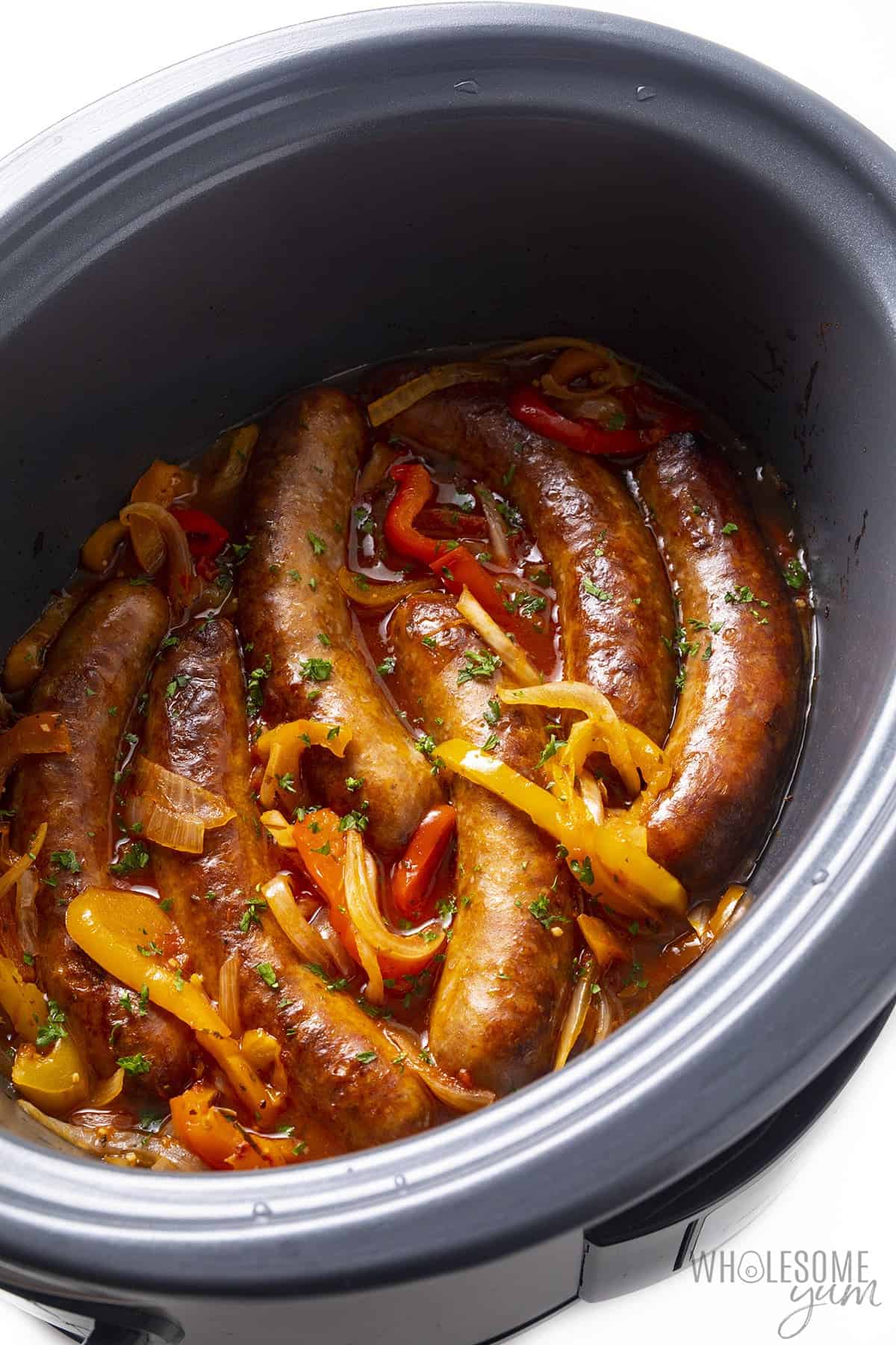Sausage and peppers in Crock Pot.