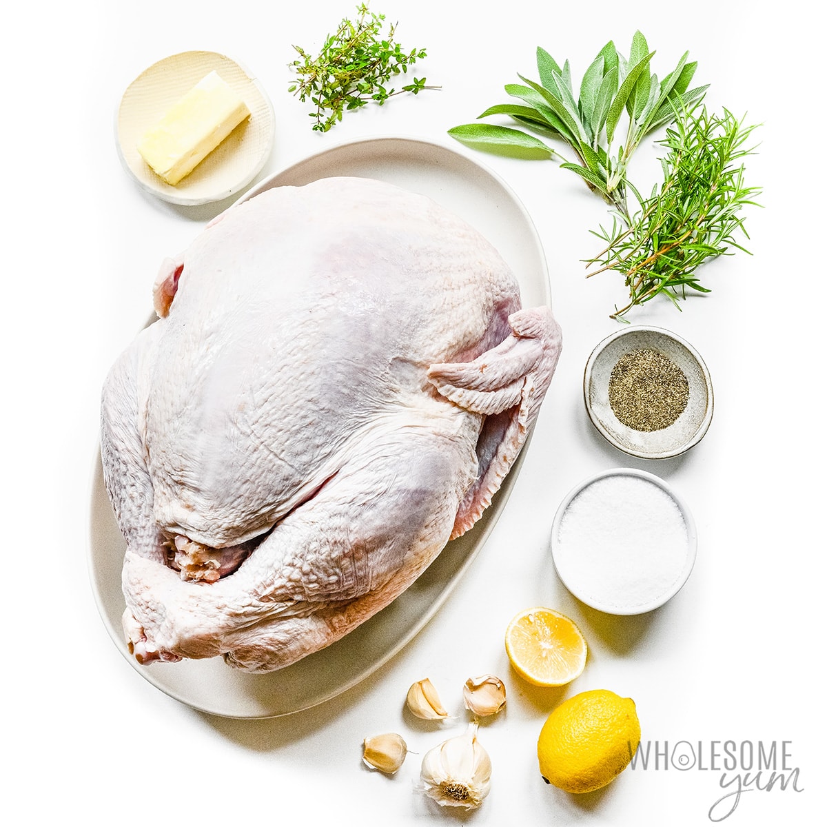 Easy roasted turkey recipe ingredients on plates.