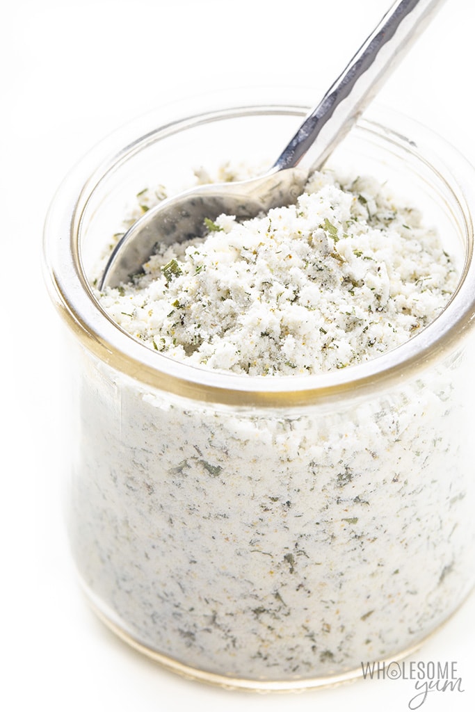 Homemade ranch seasoning in a jar with a spoon